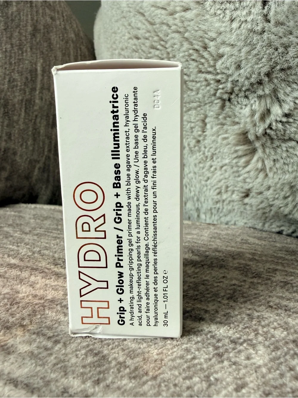 Milk Makeup Hydro Grip + Glow Primer — shimmering gold